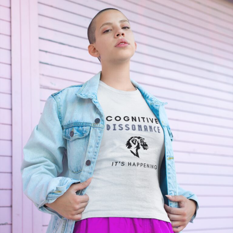 Cognitive Dissonance It's Happening Graphic t-shirt worn by a woman.