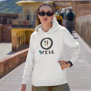 Oil Spill white hoodie worn by a woman.