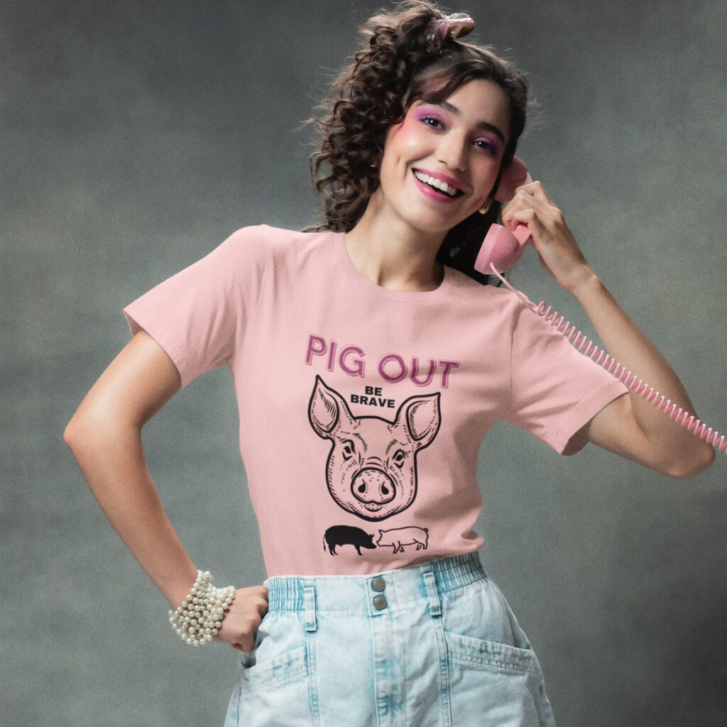 Pig Out Be Brave t-shirt worn by a woman.