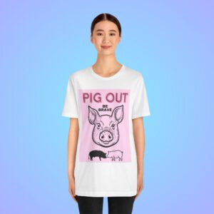 Pig Out Be Brave Pink t-shirt worn by a woman.