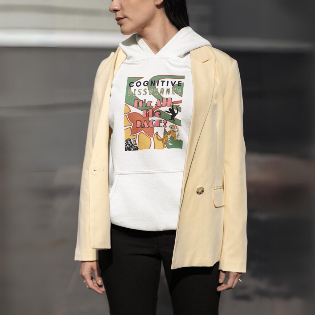 White "Deco Jungle" hoodie worn by a stylish woman.