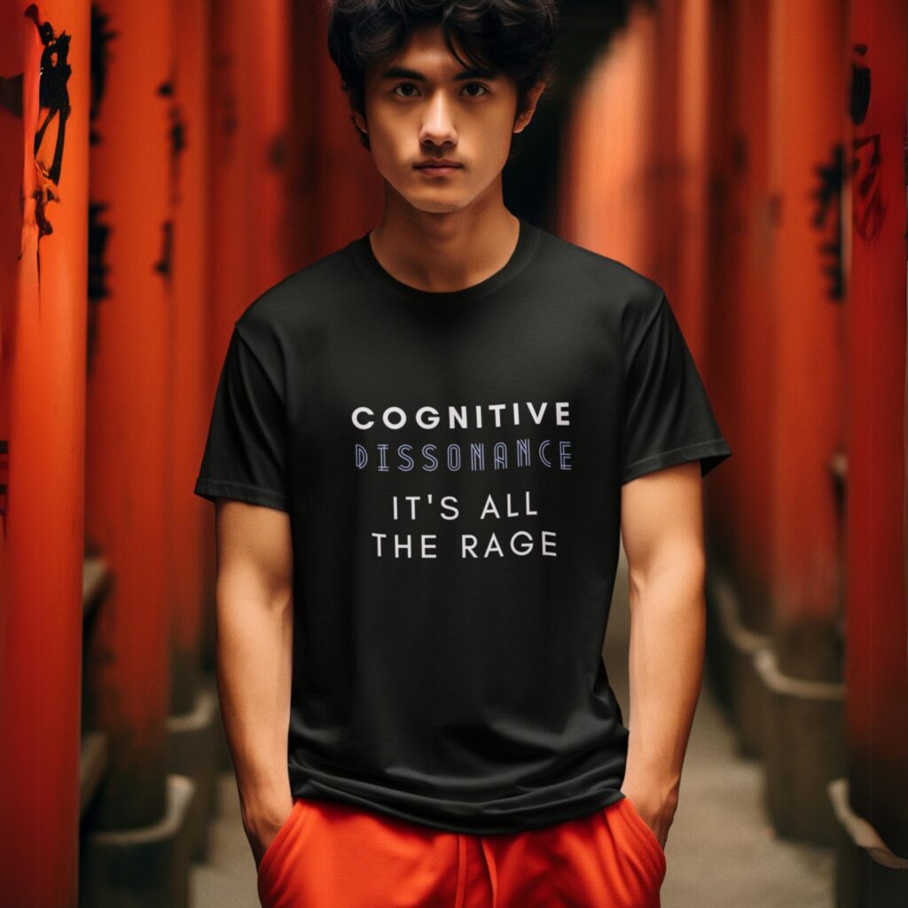 Cognitive Dissonance All The Rage t-shirt worn by a man.